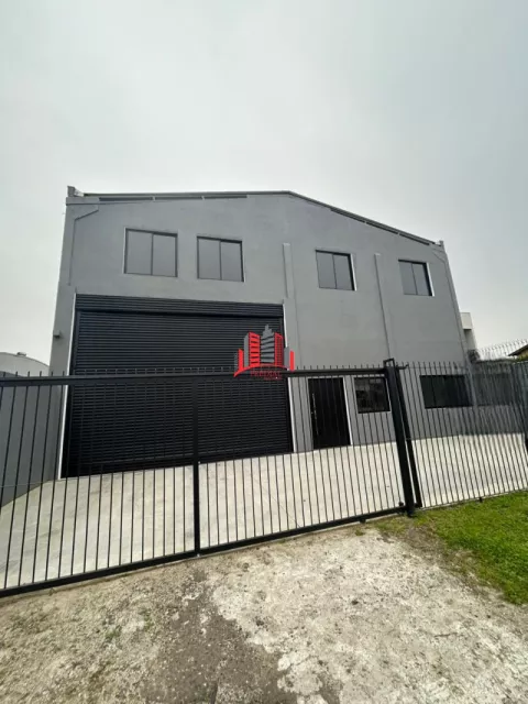 Pavilhão 400m² com entrada para caminhões e área externa na Av. Rio Grande do Sul